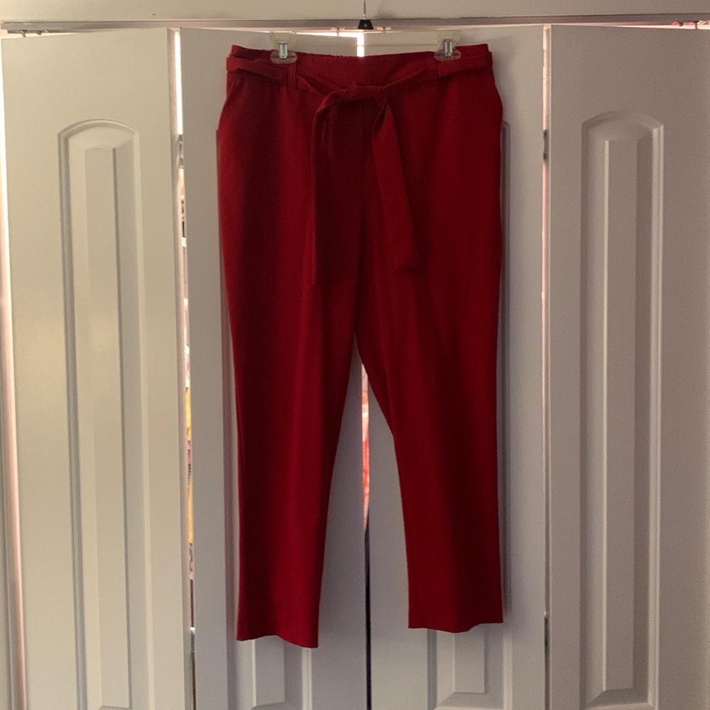 Red ankle length pants with belt.